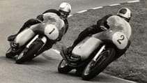 Giacomo Agostini battles Mike Hailwood