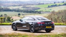 Mercedes E220d Coupe black rear three quarter