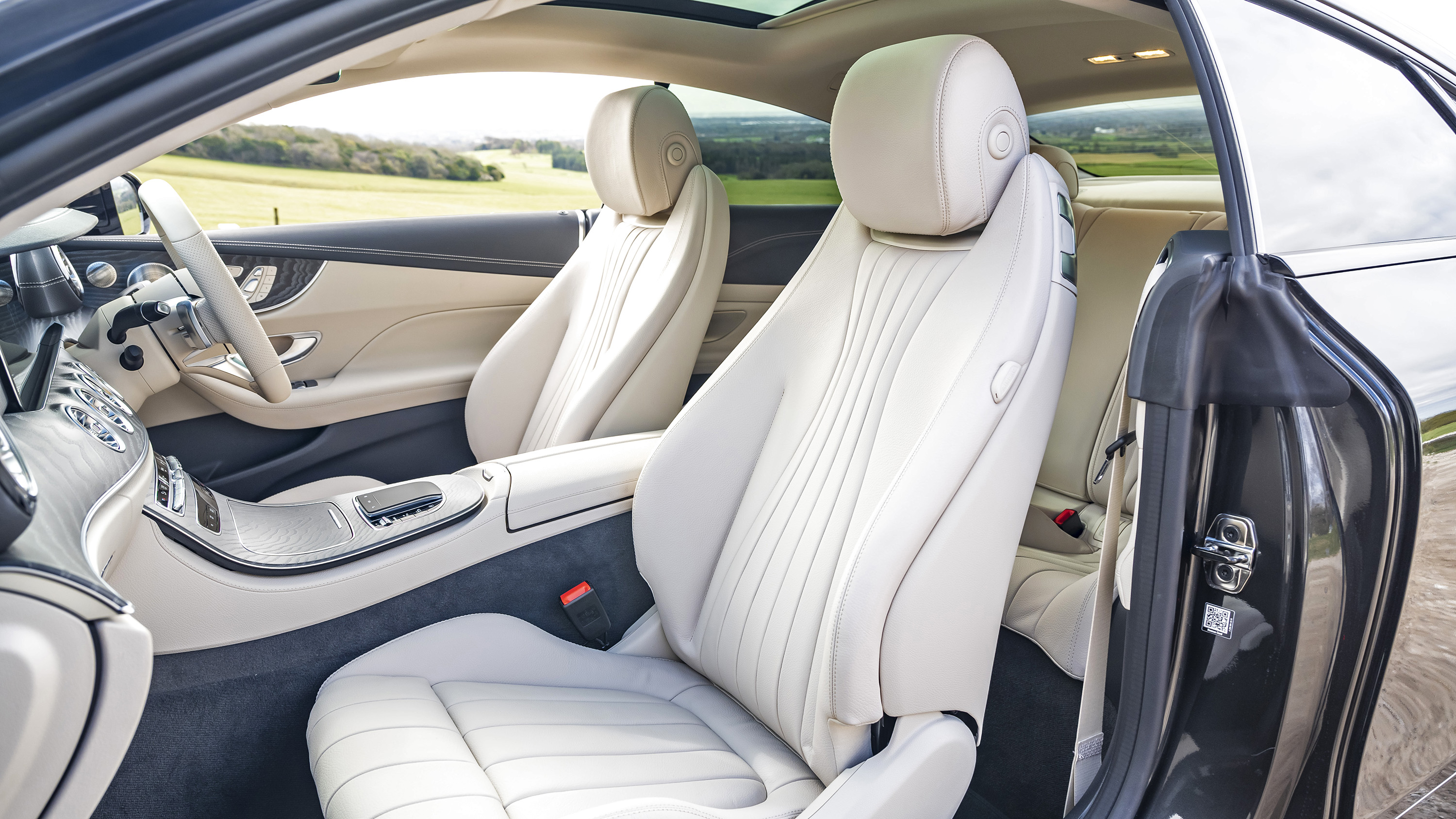 Mercedes E220d Coupe front seats in cream leather