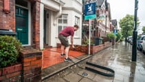 Porsche Taycan 4S EV recharging at home wallbox no driveway on street