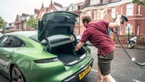 Porsche Taycan 4S EV recharging at home wallbox no driveway on street