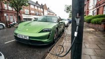 Porsche Taycan 4S EV recharging at home wallbox no driveway on street