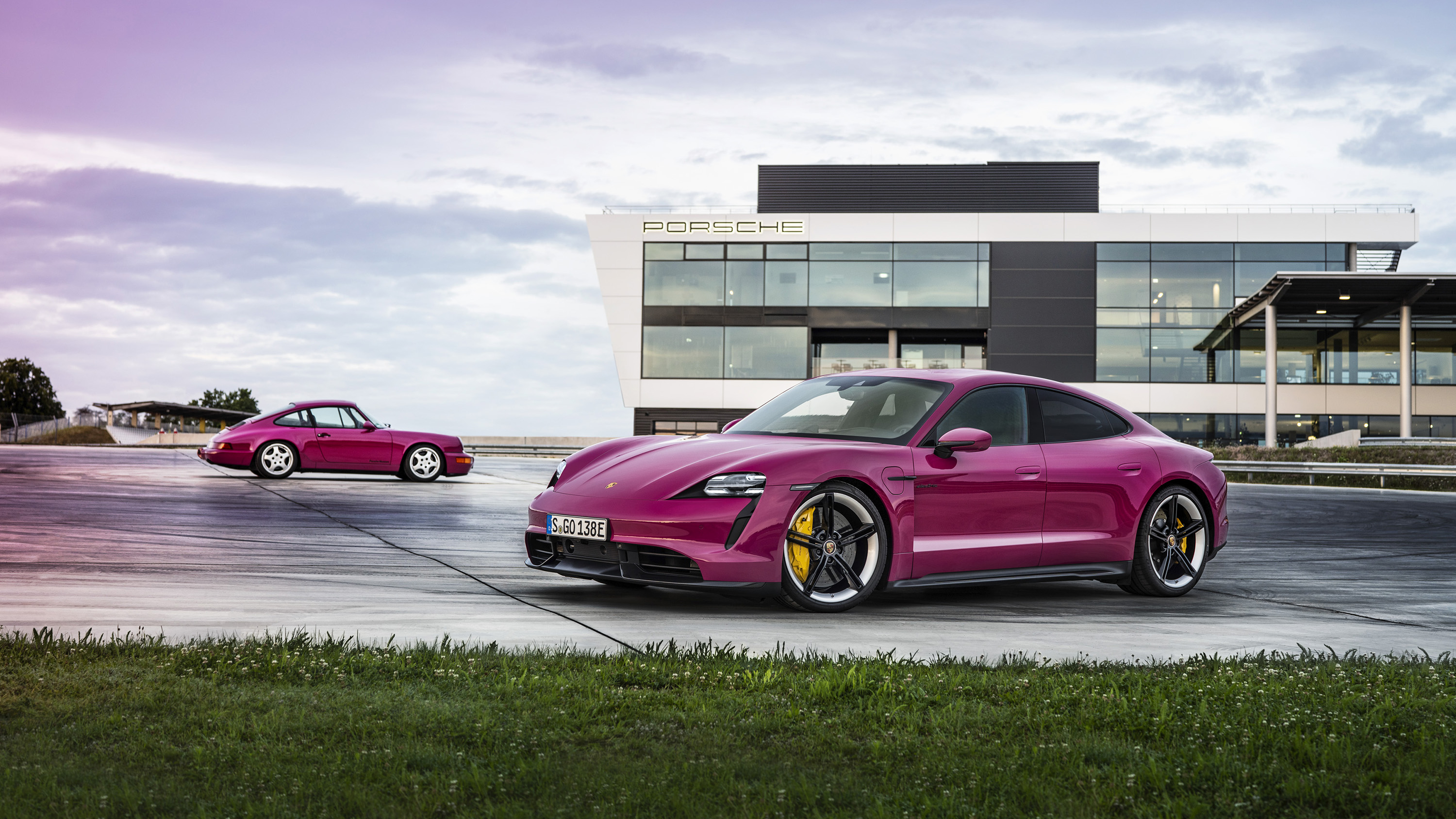 Porsche Taycan Turbo S and Porsche 911 964 in Rubystone Red