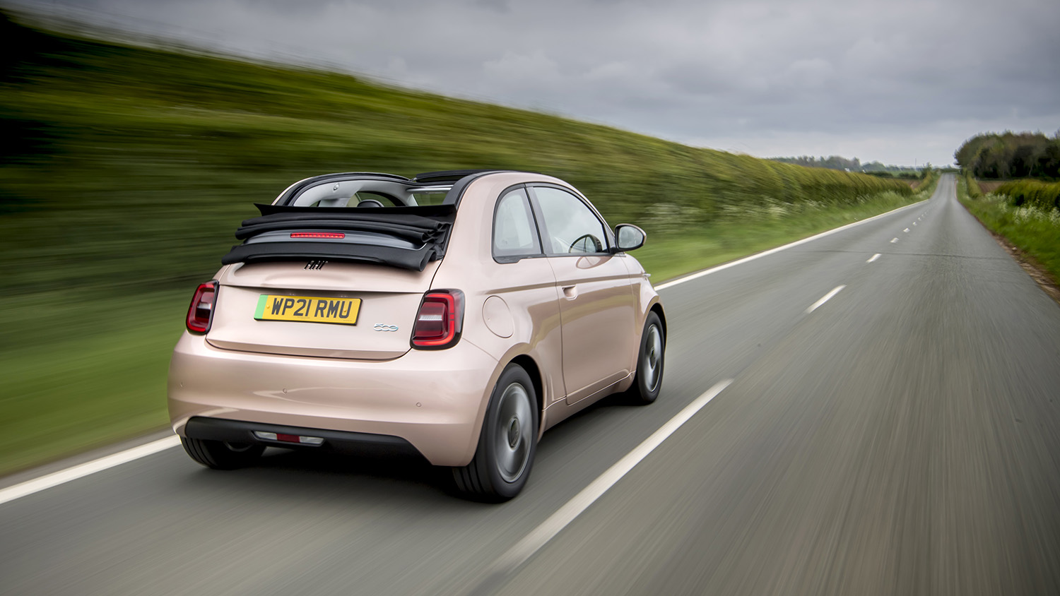 Fiat 500C rear view dynamic with roof open