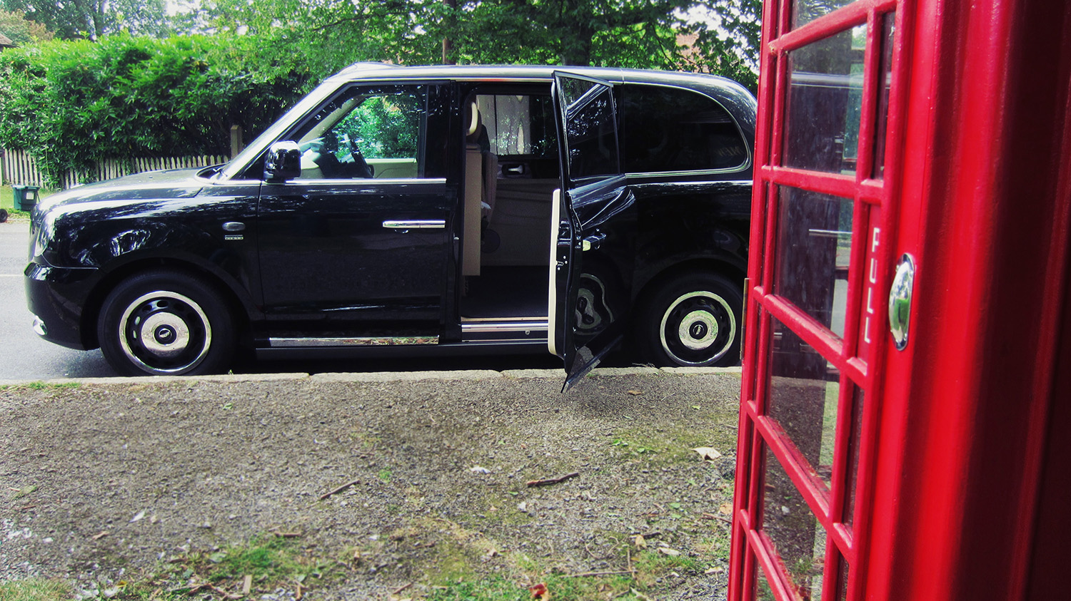 Sutton VIP LEVC Taxi parked with door open