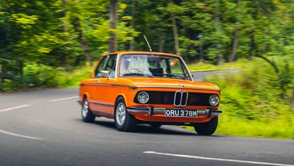 BMW 2002tii Inka Orange cornering