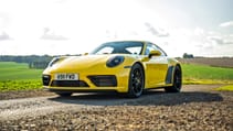 Porsche 911 Carrera 4 GTS coupe yellow front