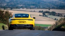 Porsche 911 Carrera 4 GTS coupe yellow action