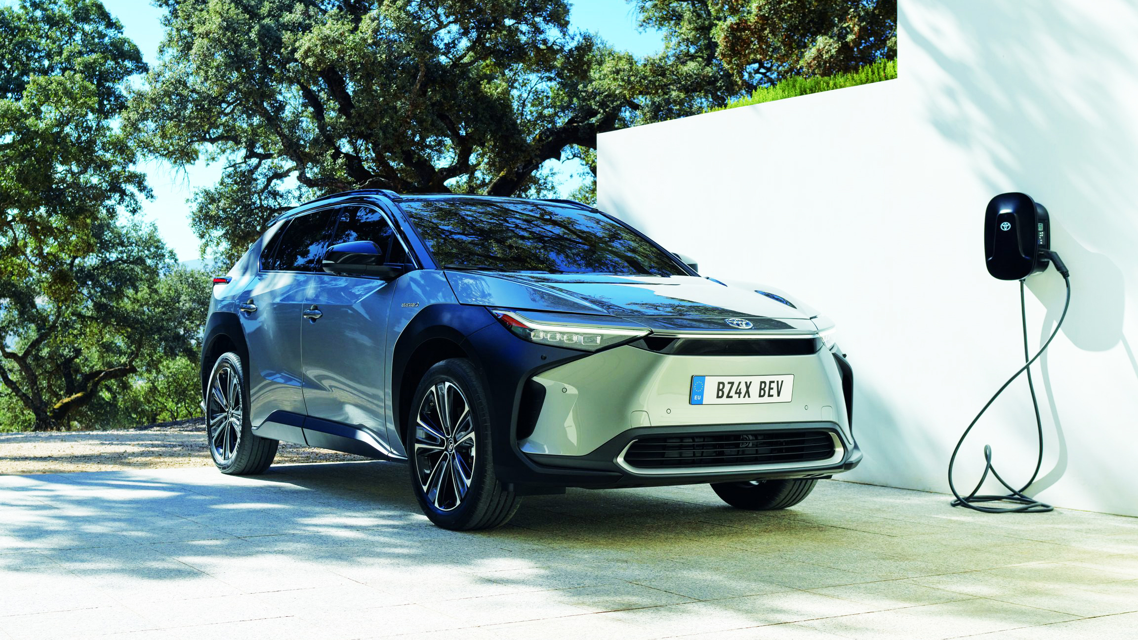 Toyota bZ4X electric car plugged in to charge