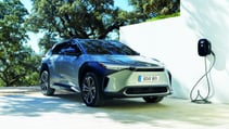 Toyota bZ4X electric car plugged in to charge