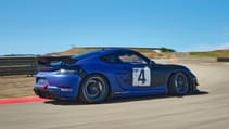 Porsche 718 Cayman GT4 RS Clubsport racecar on track rear