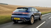 Porsche Macan Gentian Blue on gold wheels rear