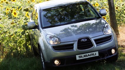 Subaru B9 Tribeca driving out of a field of sunflowers