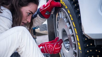 Catie Munnings adjusts the wheel nuts