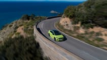 Skoda Enyaq iV Coupe vRS on a coastal road