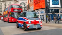 Citroen Ami driving through Piccadilly