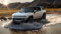 GMC Hummer EV off-roading through water