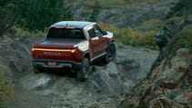 Rivian R1T offroading rear view