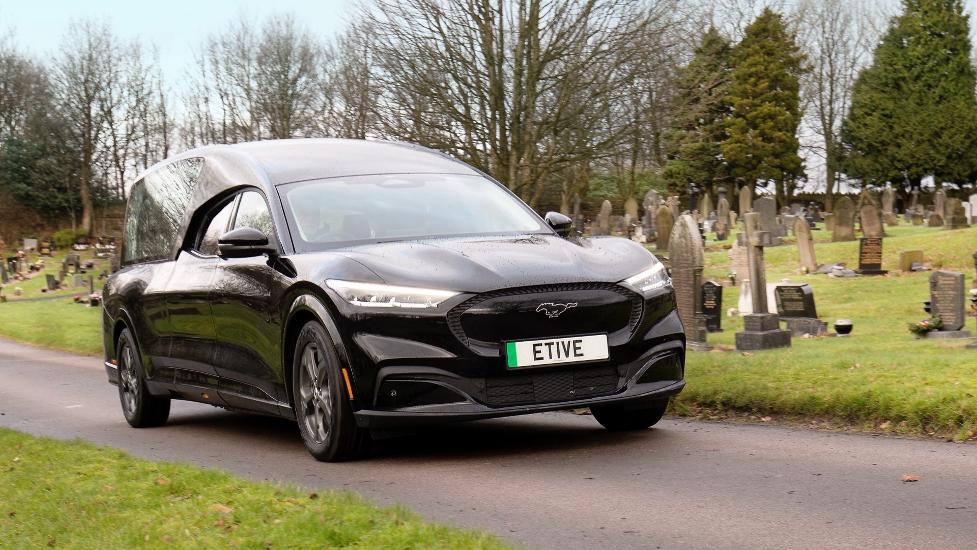 The Etive all-electric hearse static shot in a cemetery