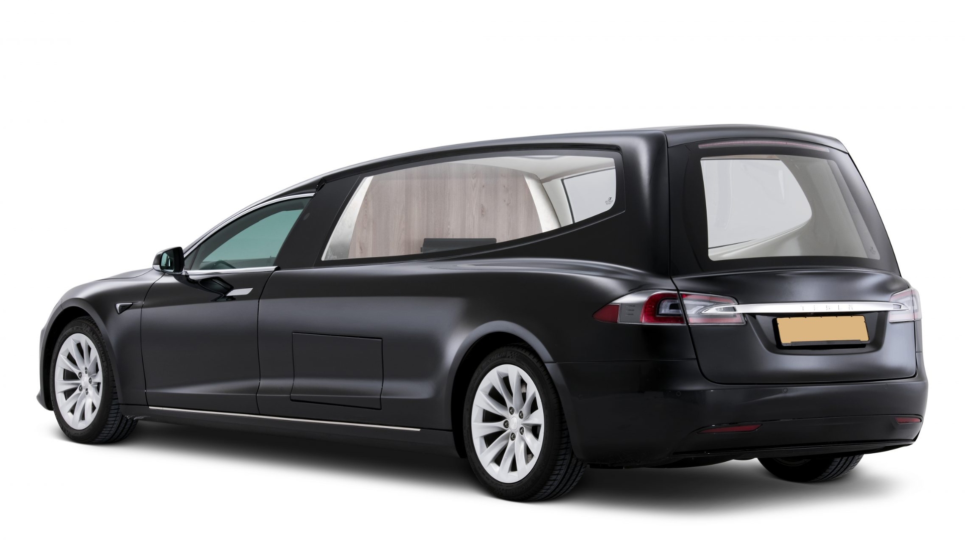 A rear static shot of the Tesla Model S-based all-electric hearse from Coleman Milne and Binz International collaboration