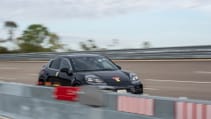 Close up shot of Porsche Macan being tested on a proving ground