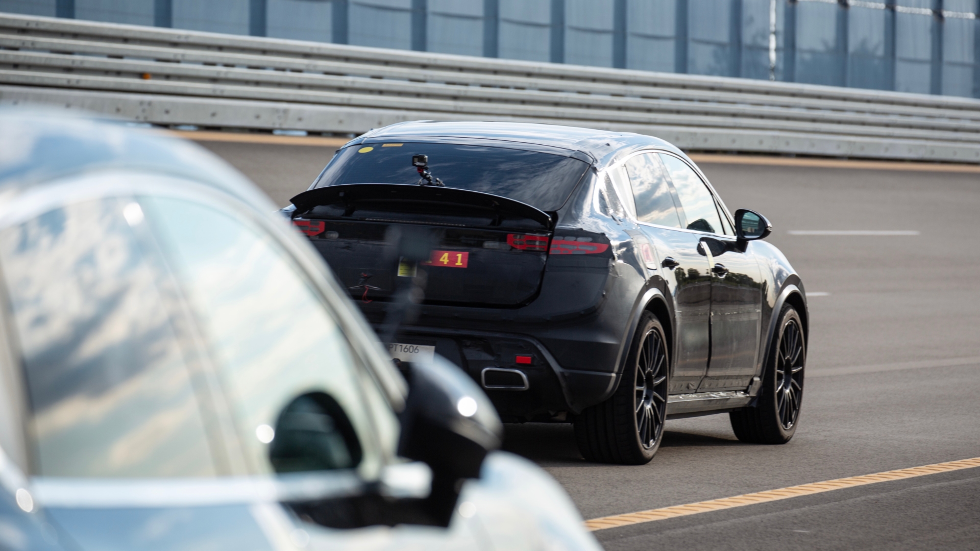 Rear shot of the Porsche Macan being tested on the proving ground