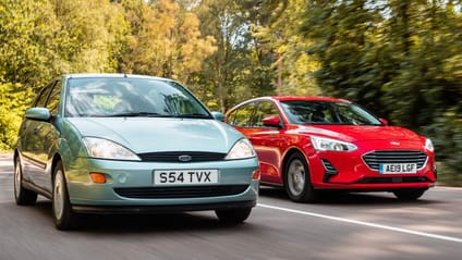 Ford Focus (3rd and 4th gen) side by side in a driving shot on a sunny day