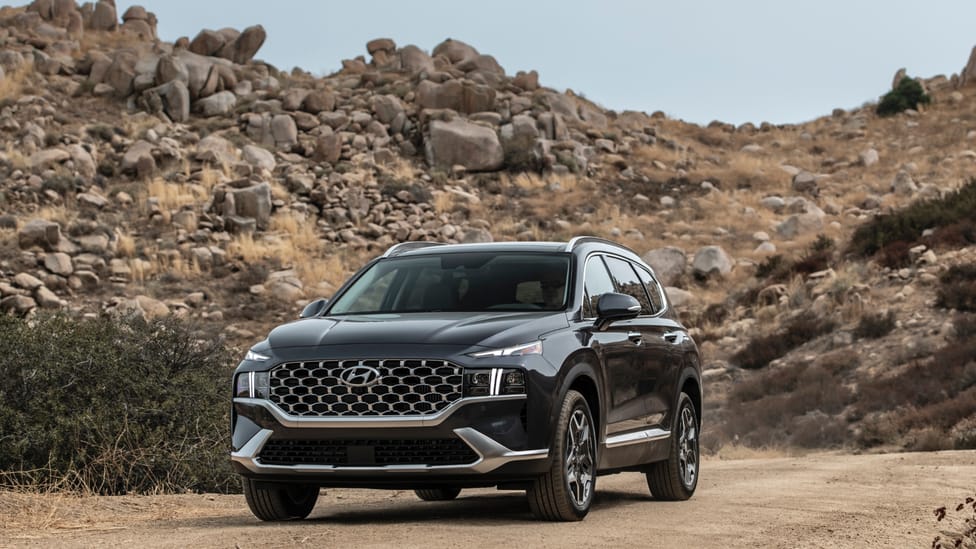 2022 Santa Fe (US version) sitting on desert track with a Mojave backdrop of Joshua trees and sand