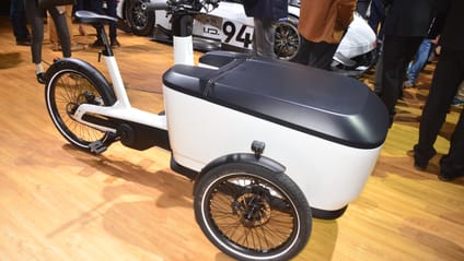 VW Cargo e-bike at exhibition with punters clustered around