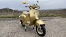 Golden scooter with celeb smarts going under the hammer