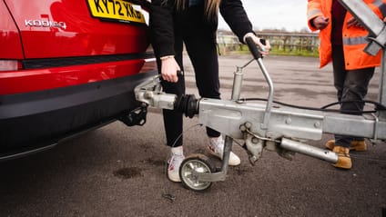 Lower trailer onto vehicle ball