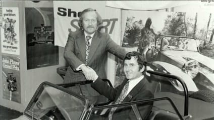 Shot of Graham Nearn and Lotus founder Colin Chapman shaking hands