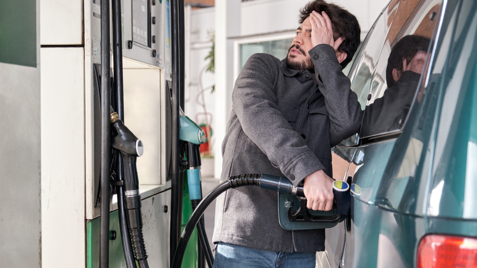 Man filling up at petrol station