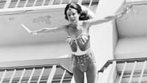 Stunt woman Kitty O'Neil dressed as Wonder Woman for mid-jump off a balcony