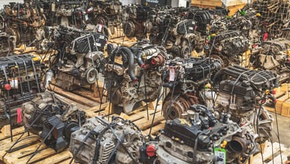 Secondhand engines sitting on pallets ready to ship