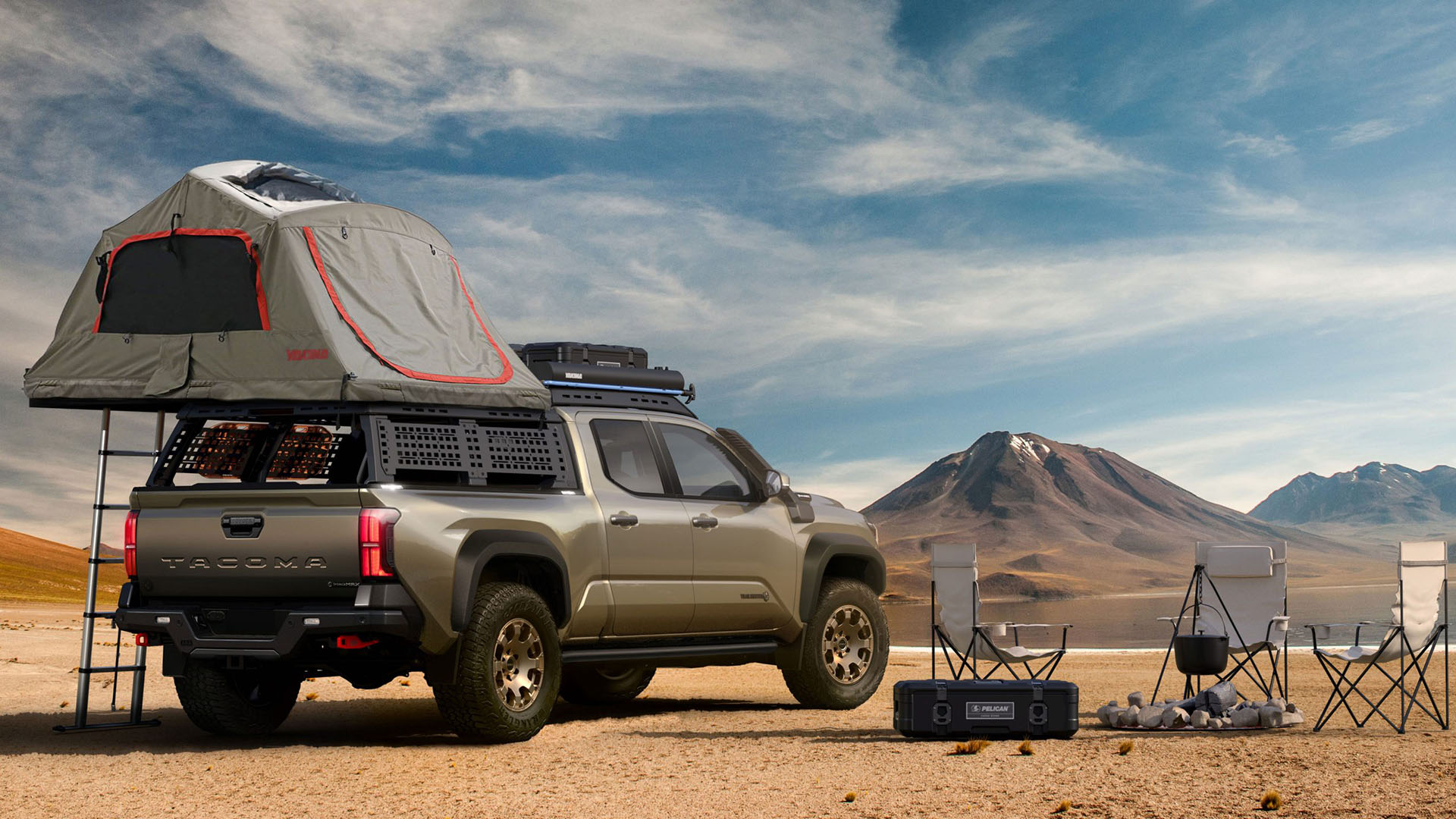 Toyota Tacoma with camper equipment attached, rooftop tent open