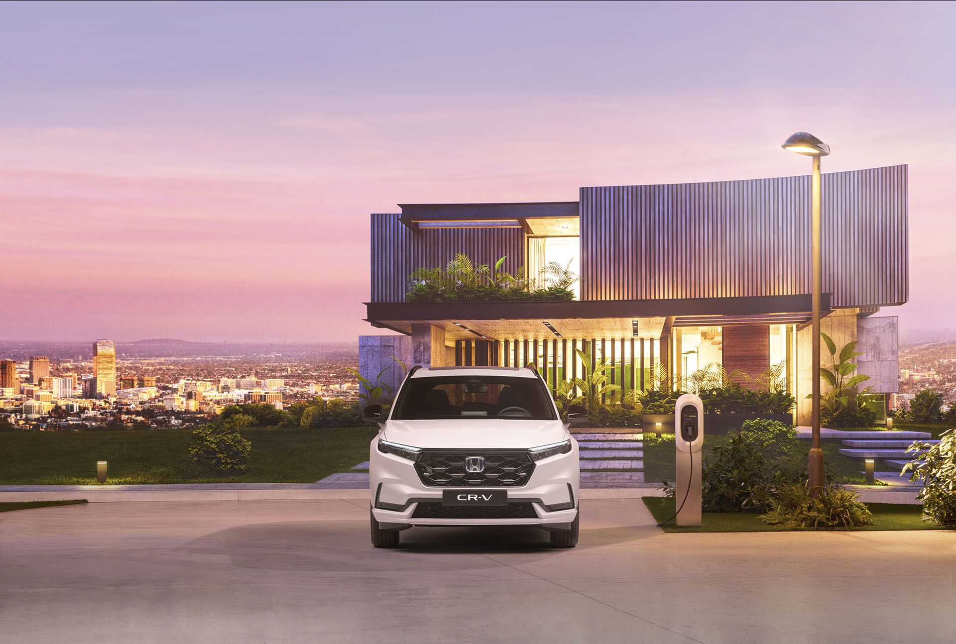 Head on shot of all-new Honda CR-V in front of futuristic property during a purple sunset