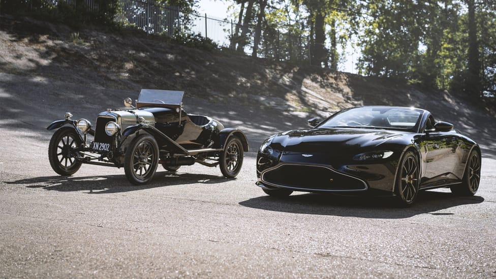 Aston Martin Vantage Roadster sitting alongside heritage Aston Martin (A3) at Brooklands