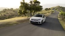 Driving shot of VW Polo GTI Edition 25 with hazy fields backdrop