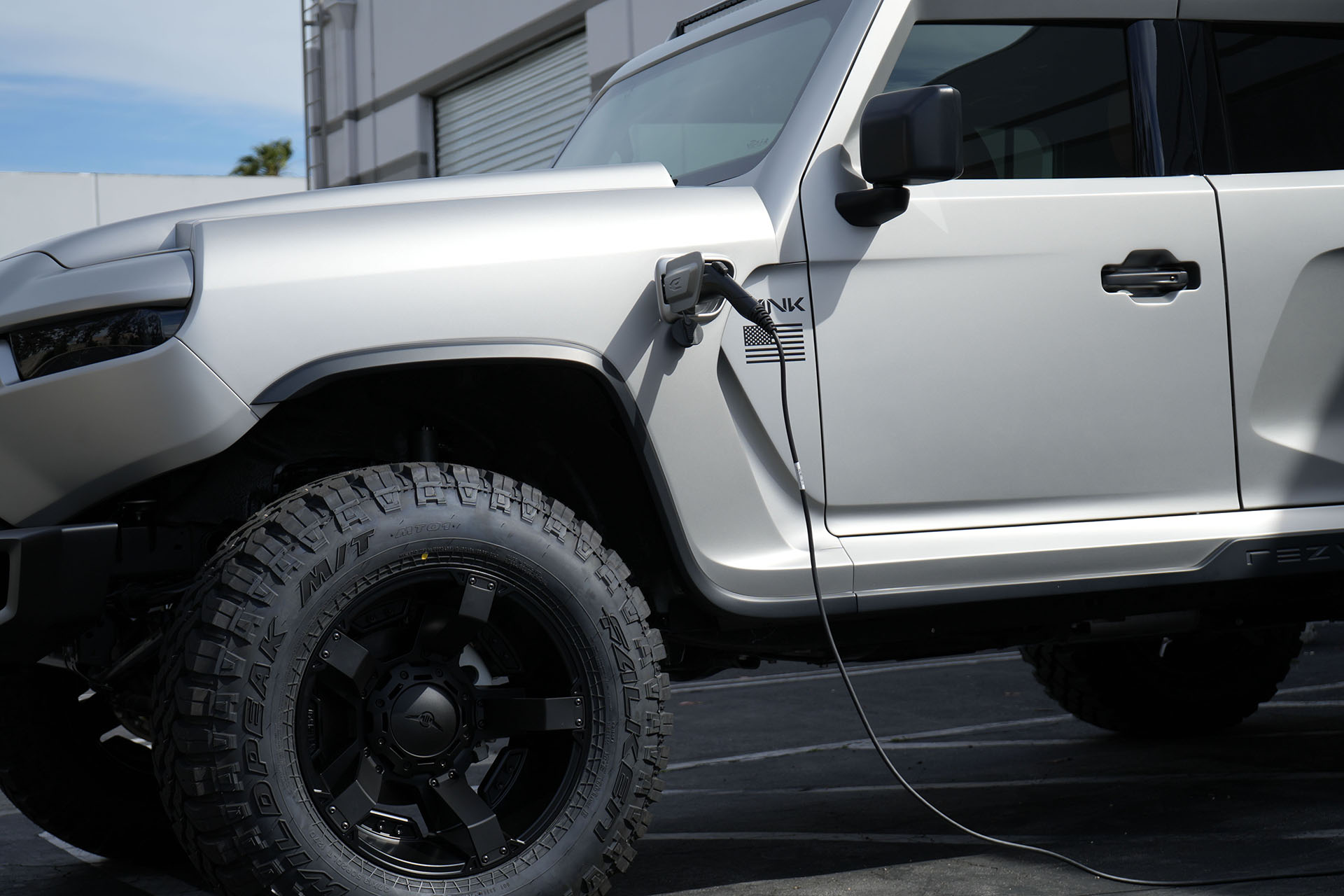 Close up of the Rezvani Tank Hybrid edition plug port