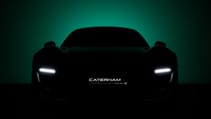 Shadowy teaser of Caterham's Project V with headlights and numberplate illuminated