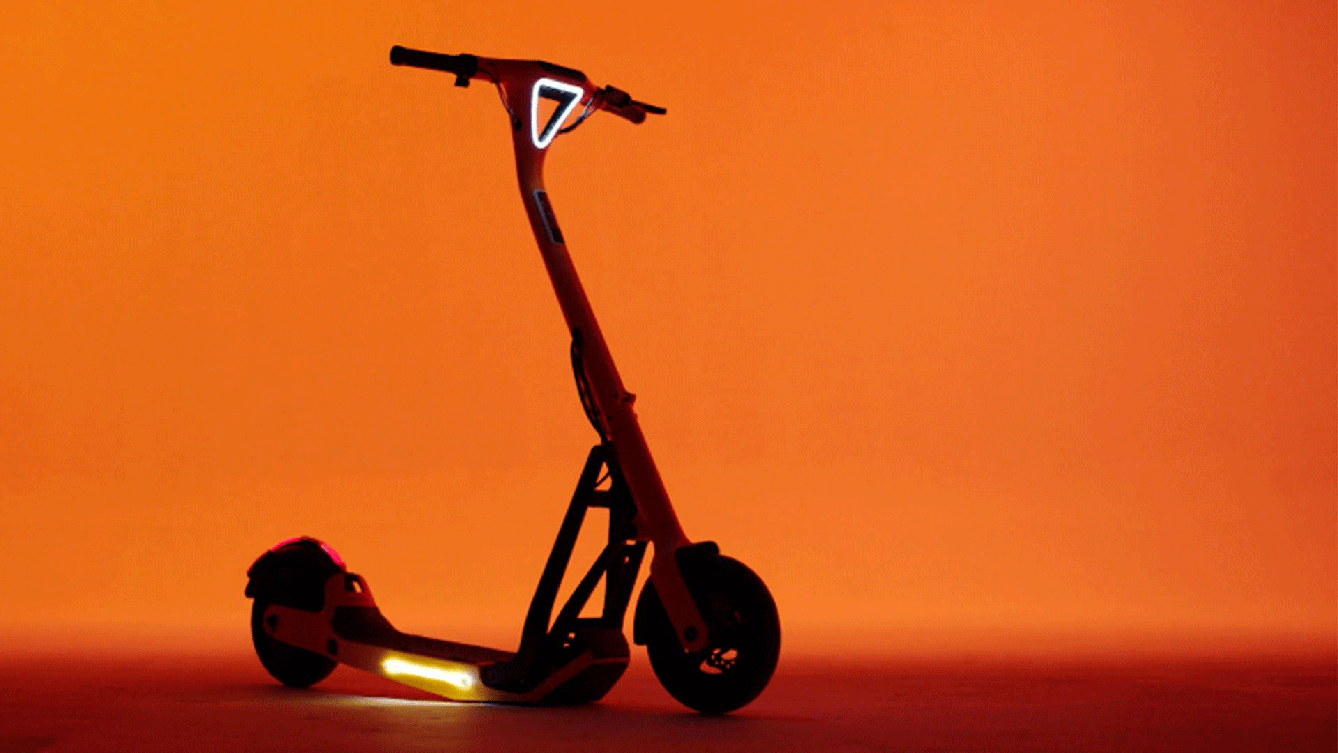 McLaren Applied, Callum designed e-scooter Lavoie Series 1, against orange background