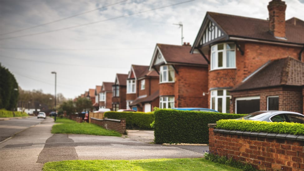 Low-traffic neighbourhoods have measures to stop cars driving that way. Image shows street with fewer cars