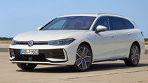 The new 2024 VW Passat Variant in white in a static shot with a blue sky background