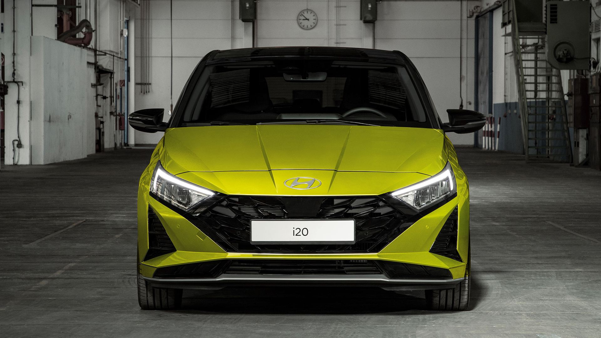 Dead-on front shot of new Hyundai i20 in hot lime colour