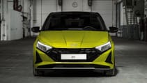 Dead-on front shot of new Hyundai i20 in hot lime colour