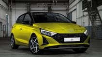 Front shot of new Hyundai i20 in hot lime colour