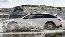 Driving shot of the Mercedes Benz E-Class All-Terrain estate, going through water