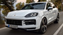 Close up driving shot of the Porsche Cayenne S E-Hybrid