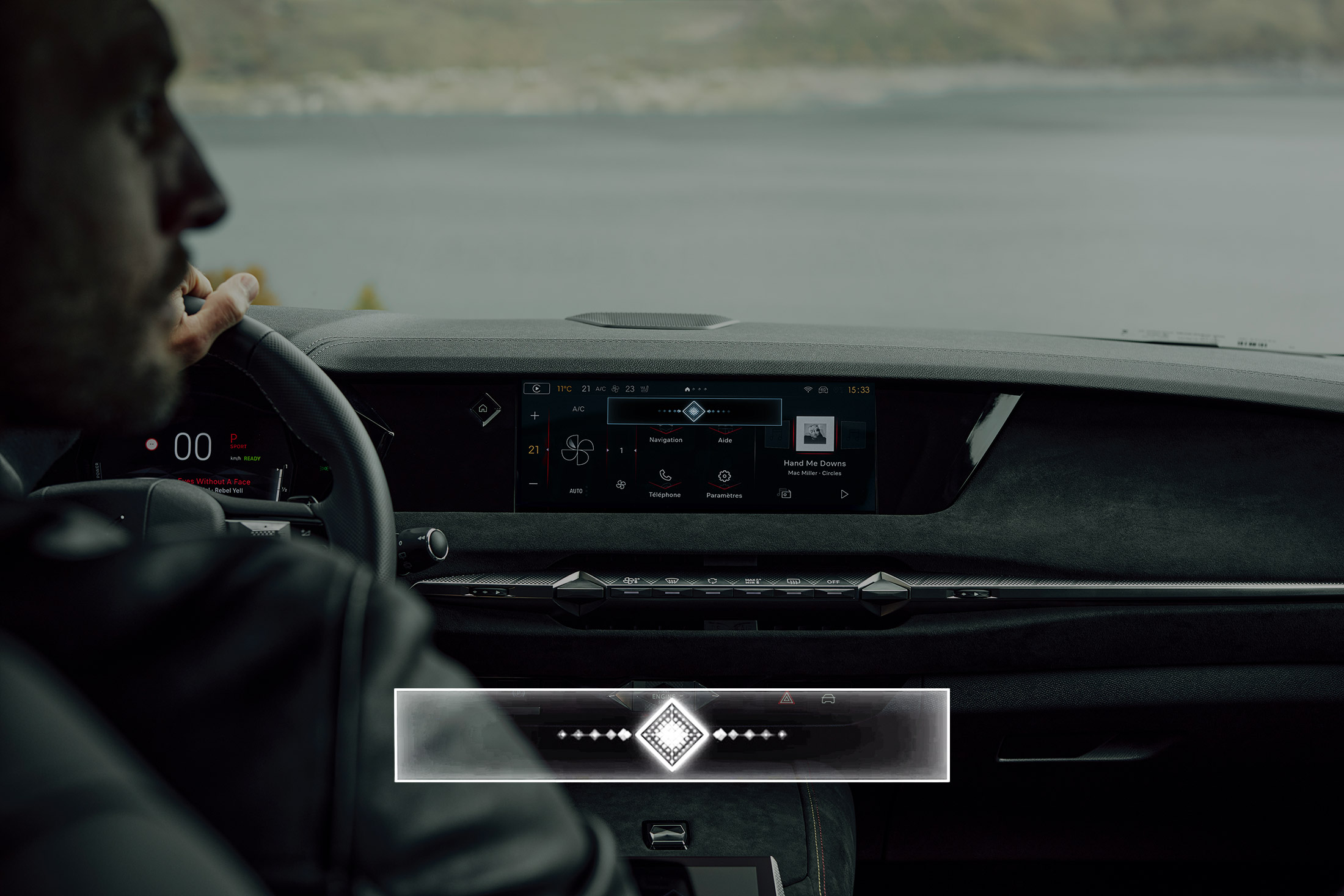 Man behind the wheel of a DS4 with the Iris voice control prompt box superimposed over the image